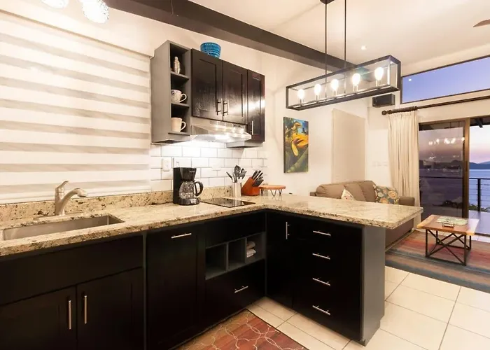 Modern With Covered Balcony, Full Kitchen, And Stunning Ocean Views Playa Flamingo
